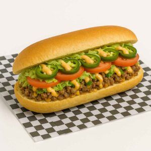 Hyper-realistic Spicy Chopped Cheese Sandwich on a fresh 12" hero roll with beef, melted American cheese, lettuce, tomato, jalapeños, and chipotle mayo drizzle on check deli paper. Perfect spicy lunch near me in Newport News.