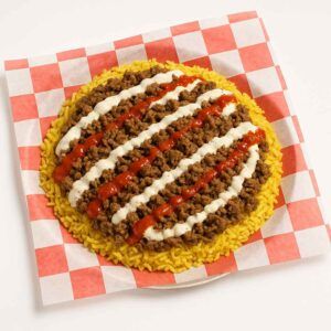 Hyper-realistic Lamb Over Rice platter on check deli paper with tender seasoned lamb served over fluffy yellow rice, drizzled with creamy white sauce and spicy hot sauce. Perfect Halal food or lunch near me in Newport News.